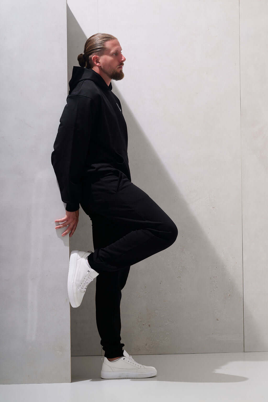 Side profile showing the hood structure and hoodie length - KAVEON
